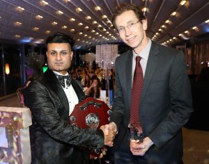 Mohammed Rauf receiving the Tony Berry award from Tony’s son Spencer